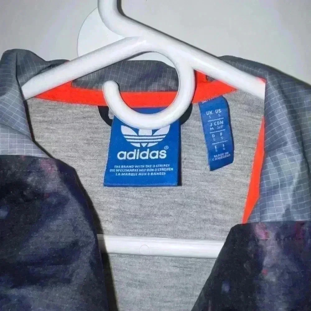 Adidas Originals running hoodie with marbled pouch